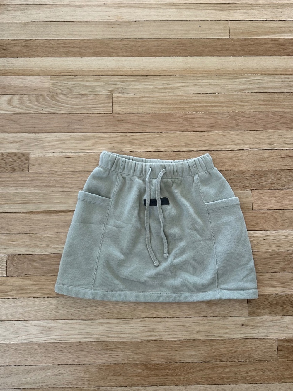 Essentials seafoam sage green mini skirt